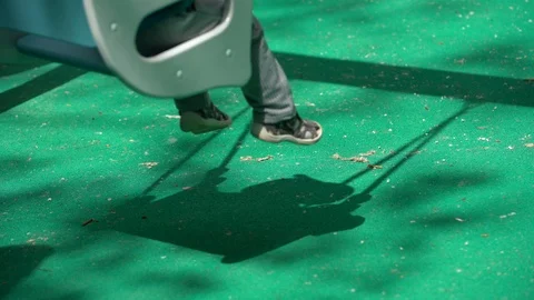 A small child swinging on a swing Stock Footage 108736967