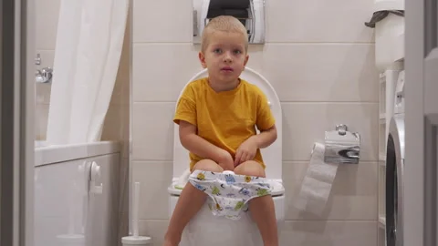 Small child trainig use toilet. Stock Footage 295164563