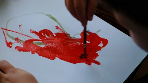 A Small Child/Boy Draws With Paints On A Sheet Of Paper Stock-Footage 111419416