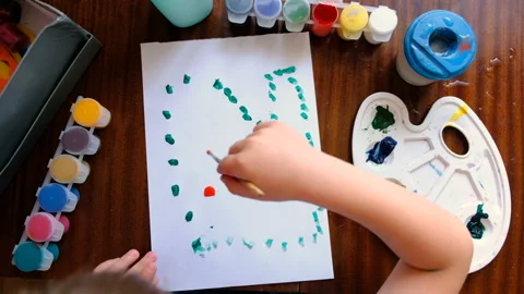 A Small Child/Boy Draws With Paints On A Sheet Of Paper Stock-Footage 111419935