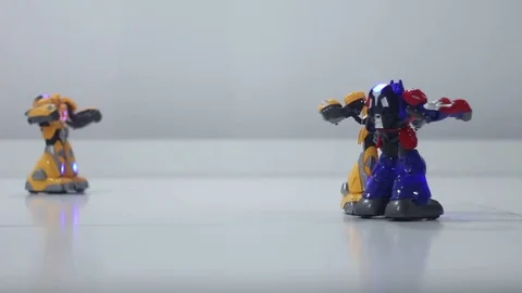 Small children Fighting robots Stock Footage 81786747