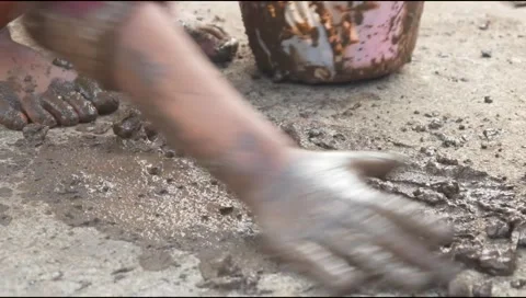 Small Childs hands playing with sand and mud. child playing outdoors with mud Stock-Footage 312097504