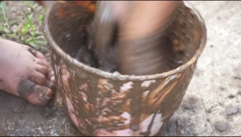 Small Childs hands playing with sand and mud. child playing outdoors with mud Stock Footage 312097506