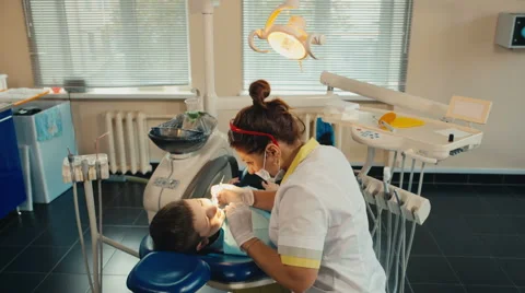 Small child's visit to the dentist Stock-Footage 54682104