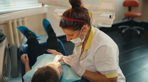 Small child's visit to the dentist Stock-Footage 54682193