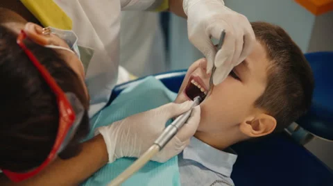 Small child's visit to the dentist Stock-Footage 54682423