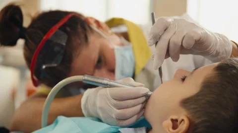 Small child's visit to the dentist Stock-Footage 54682539
