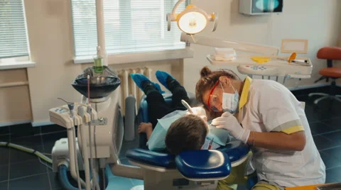 Small child's visit to the dentist Stock-Footage 54682604