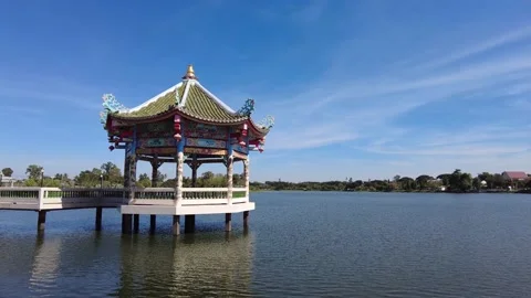 Small china temple built in the water in Udon Thani, Thailand Stock Footage 148733632