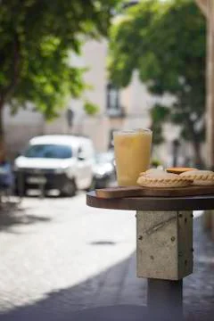Small chopping board displaying typical food from Portugal and South America, Stock Photos