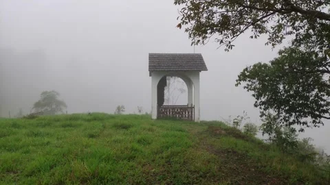 Small christian chapel on a cloudy mountain near Pozuzo, Peru 스톡 동영상 283237696