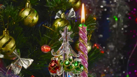 A small Christmas tree on the background of a large green Christmas tree Stock Footage 145068970