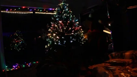 Small Christmas tree on a dining table Stock Footage 82744548