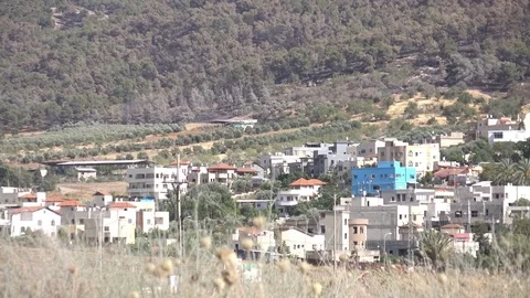 Small City at Base of Mountain Slope in Israel Stock Footage 78546175