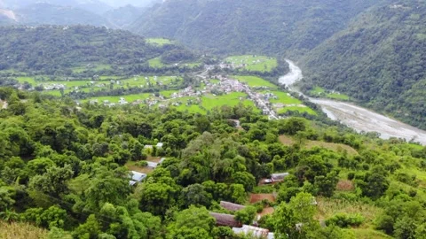 Small city located in the bank of river, Nepal aerial video Stock Footage 155277002