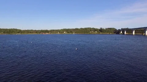 Small City Riverfront at Dusk Stock Footage 97243648