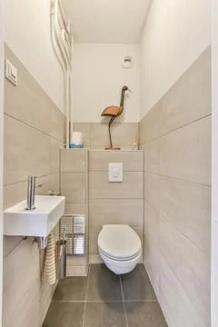 Small clean washroom Stock Photos