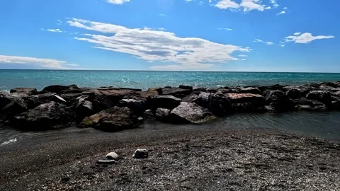 Small cliff on the beach in Liguria Stock Footage 309058250