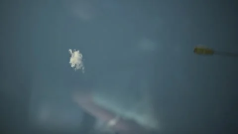 A small cloud in the blue sky as seen through the sunroof of a car Stock Footage 345868579