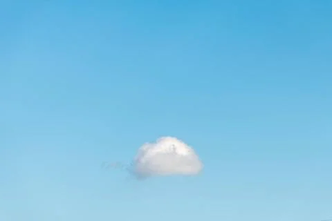 Small cloud isolated in the blue sky. Small cloud isolated in the blue sky... Stock Photos