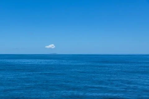 Small Cloud Over Small Fregate Island Stock Photos