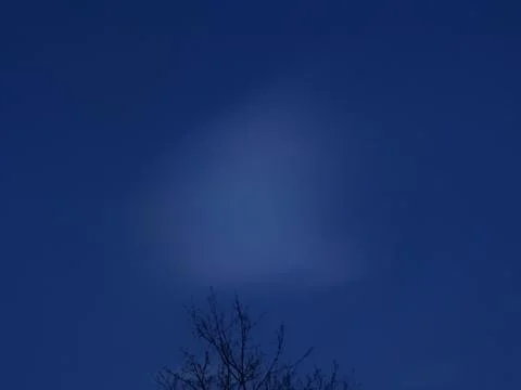 A small cloud in the sky Stock Photos