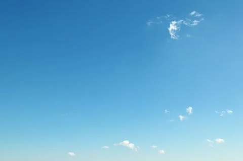 Small clouds on blue sky 写真素材