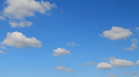 Small clouds flying across the sky Stock Footage 30302957
