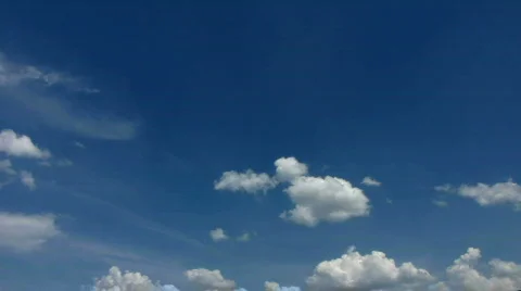  Small clouds moving in a blue sky Stock Footage 420245