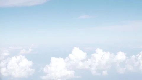 Small Clouds from Plane Window Seat Stock Footage 291509265