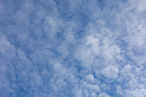 Small clouds in sky background Stock Photos