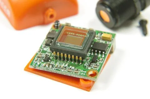 Small CMOS camera sensor inside analog drone FPV camera Stock Photos