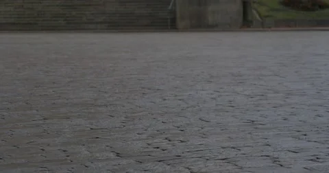 Small cobblestone sidewalk made of cubic stones Video stock 43650422