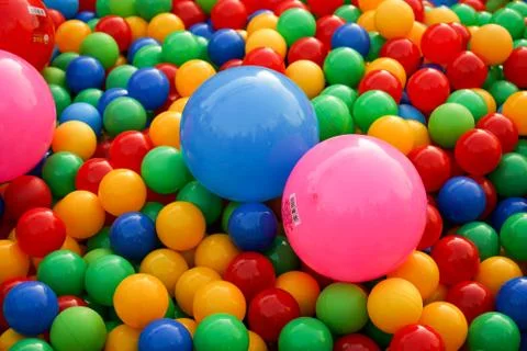Small colored balls. Background with colored balls. Stock Photos