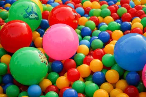 Small colored balls. Background with colored balls. Stock Photos