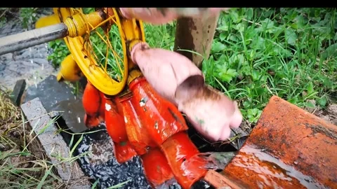 A small colored water mill made from bright plastic bottles. Recycling plastic a Stock Footage 277897049