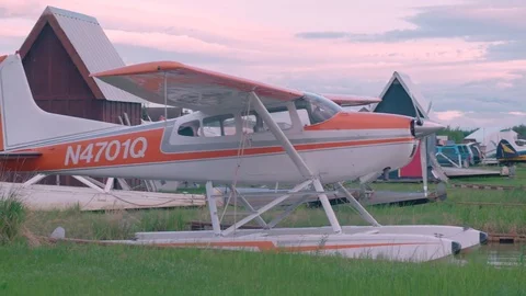 Small Colorful Single Engine Seaplanes in Water near Airport in Anchorage Stock Footage 83122053