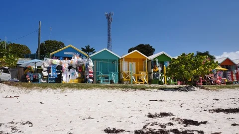 Small coloured shops in caribbean style on the beach Vídeo Stock 126710098