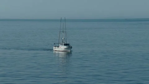 https://images.pond5.com/small-commercial-fishing-boat-footage-132007116_iconl.jpeg