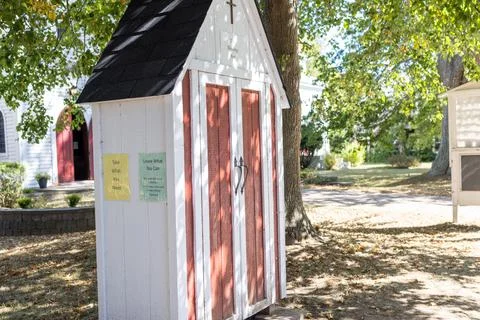 Small community blessing box beside a church in Prince Edward Island Canada.. Fotos de archivo