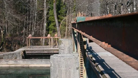 Small concrete dam on Alpine river in Slovenia Stock Footage 150577730