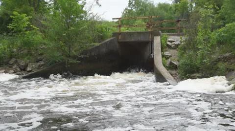 Small Concrete Dam and Whitewater Stock Footage 50818554