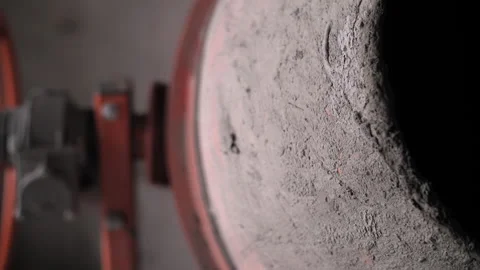 Small concrete mixer on the construction site is spinning Stock Footage 247400384