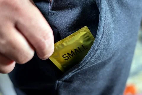 Small condom size and small penis problem Stock Photos