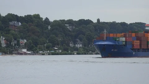 Small Container ship leaving Hamburg Stock Footage 98160757
