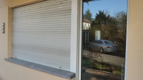 Small Corner Store Owner Puts Up Bankruptcy Sign On Front Door, Coronavirus Stock Footage 127708444