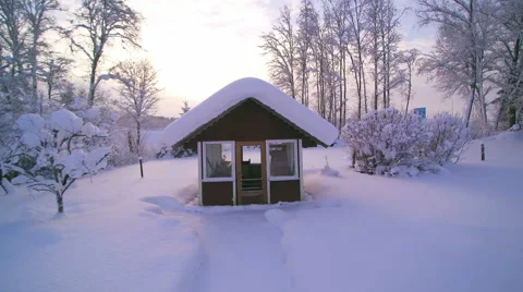 The small cottage house filled in white snow Stock Footage 59688183