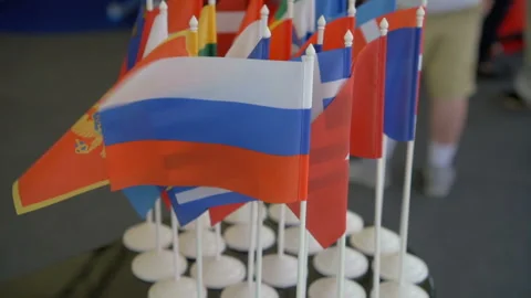 Small country flags are fluttering in the wind. Stock Footage 126353367