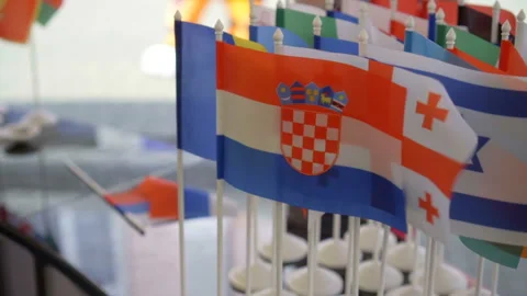 Small country flags are fluttering in the wind. Stock Footage 126366916