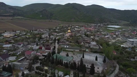 Small cozy town in the mountains, shooting with a drone. Beautiful architecture Stock Footage 159897155